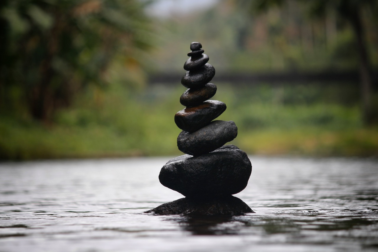 Picture of a tower of stacked stones in a river